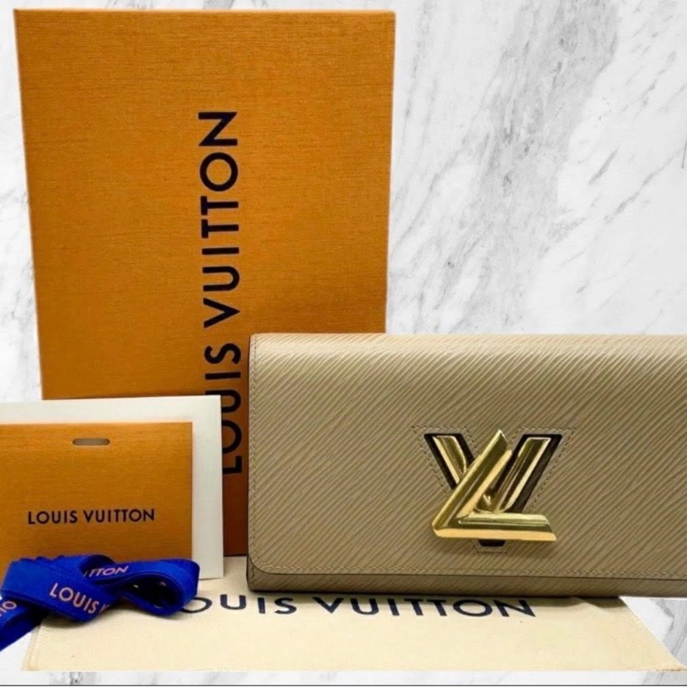 Louis Vuitton Beige Wallet with Gold Logo